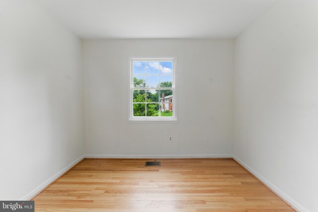 13021 Morningside Ln, Silver Spring, MD 20904 - empty room featuring light wood-type flooring and baseboards