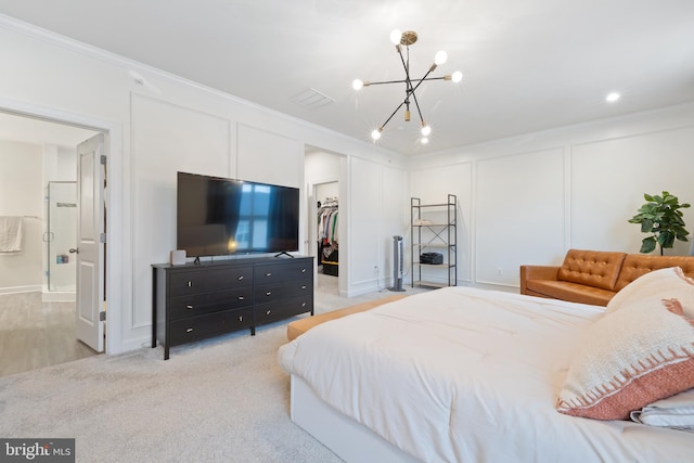 12363 Azure Ln Unit 42, Fairfax, VA 22033 - bedroom with a chandelier, ornamental molding, a spacious closet, a closet, and a decorative wall