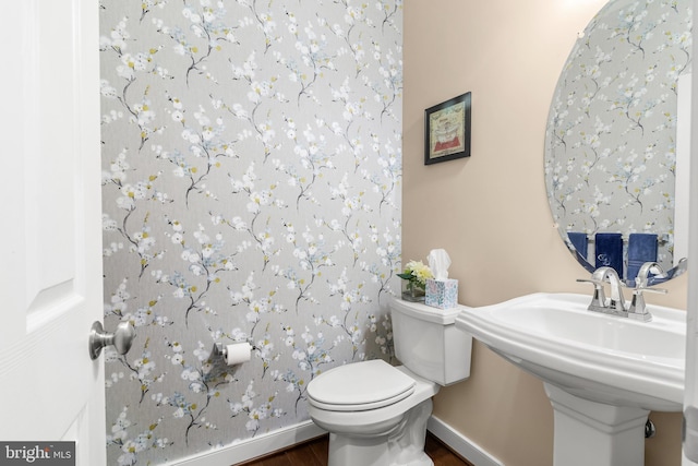 14039 Fox Hill Rd, Sparks, MD 21152 - half bathroom with wood finished floors, toilet, and baseboards