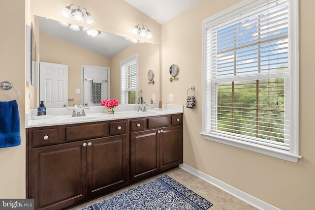 14039 Fox Hill Rd, Sparks, MD 21152 - full bathroom with double vanity, baseboards, tile patterned floors, and lofted ceiling