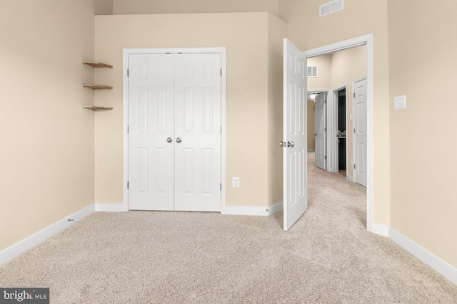14039 Fox Hill Rd, Sparks, MD 21152 - unfurnished bedroom with light colored carpet, a closet, and baseboards