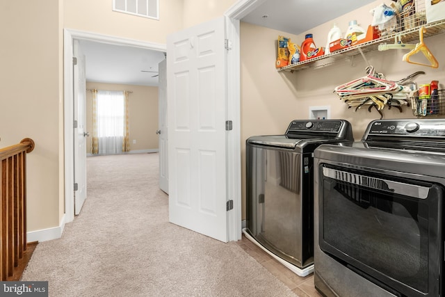 14039 Fox Hill Rd, Sparks, MD 21152 - laundry room featuring washing machine and dryer, light carpet, and baseboards