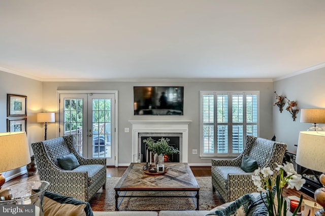 11920 Mays Chapel Rd, Lutherville Timonium, MD 21093 - living room with healthy amount of natural light, ornamental molding, wood finished floors, a premium fireplace, and french doors
