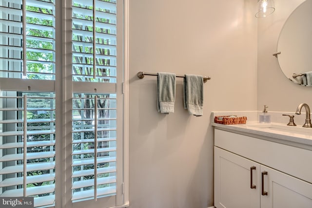 11920 Mays Chapel Rd, Lutherville Timonium, MD 21093 - bathroom with healthy amount of natural light and vanity
