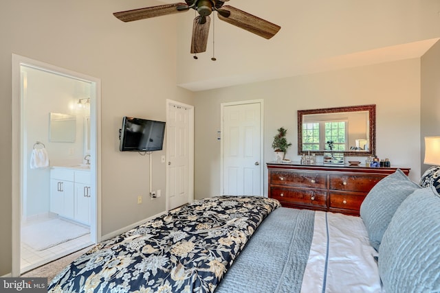 11920 Mays Chapel Rd, Lutherville Timonium, MD 21093 - bedroom with high vaulted ceiling, ensuite bath, a ceiling fan, and light colored carpet