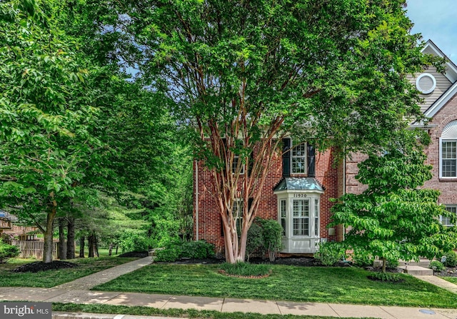 11920 Mays Chapel Rd, Lutherville Timonium, MD 21093 - view of front of property with brick siding and a front yard