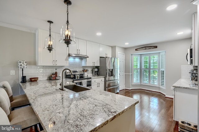 11920 Mays Chapel Rd, Lutherville Timonium, MD 21093 - kitchen featuring stainless steel appliances, a sink, white cabinets, dark wood-style flooring, and light stone counters