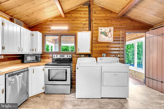 11621 Deadwood Dr, Lusby, MD 20657 - laundry area with independent washer and dryer, wood walls, and wood ceiling