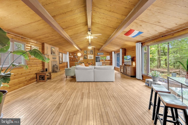 11621 Deadwood Dr, Lusby, MD 20657 - living room featuring wood ceiling, hardwood / wood-style floors, wood walls, and a ceiling fan