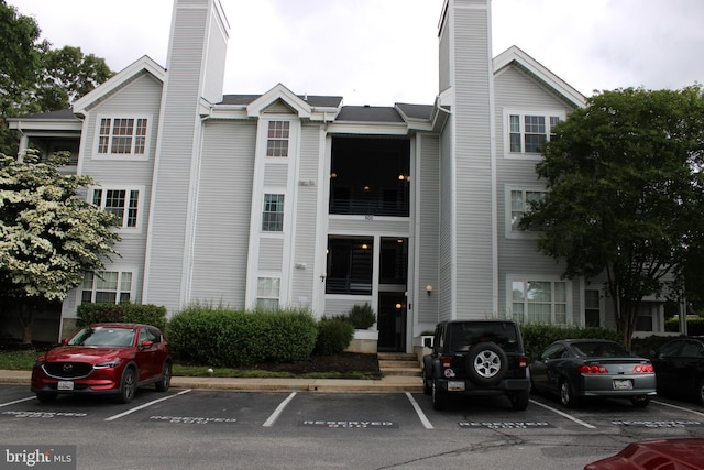 600 Moonglow Rd Unit 302, Odenton, MD 21113 - view of building exterior featuring uncovered parking