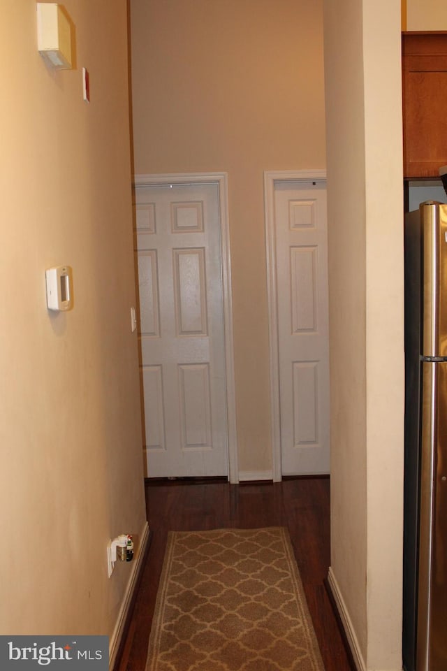 600 Moonglow Rd Unit 302, Odenton, MD 21113 - hall featuring dark wood finished floors and baseboards
