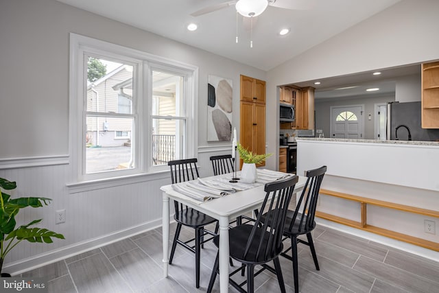 609 Eldrid Dr, Silver Spring, MD 20904 - dining area with a wainscoted wall, a ceiling fan, healthy amount of natural light, lofted ceiling, and recessed lighting