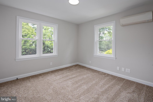 609 Eldrid Dr, Silver Spring, MD 20904 - carpeted spare room featuring a wall mounted air conditioner and baseboards