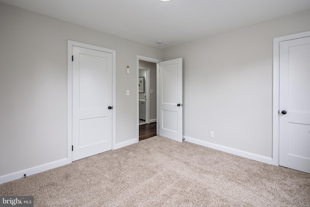 609 Eldrid Dr, Silver Spring, MD 20904 - unfurnished bedroom with carpet floors and baseboards