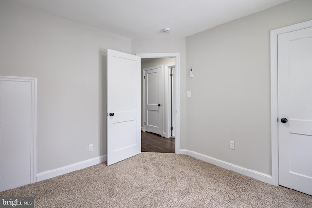 609 Eldrid Dr, Silver Spring, MD 20904 - unfurnished bedroom with carpet flooring and baseboards