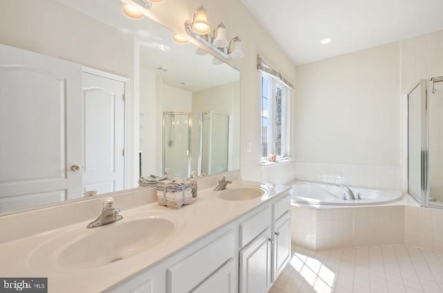 8 Rivers Edge Ter, Indian Head, MD 20640 - bathroom with a garden tub, a shower stall, double vanity, and tile patterned flooring