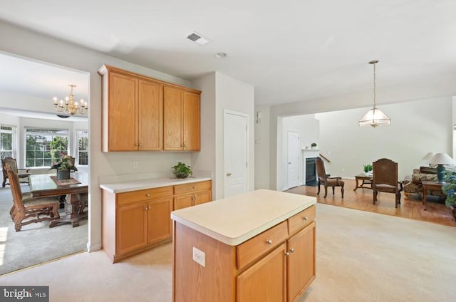 8 Rivers Edge Ter, Indian Head, MD 20640 - kitchen featuring a chandelier, light countertops, decorative light fixtures, and a center island