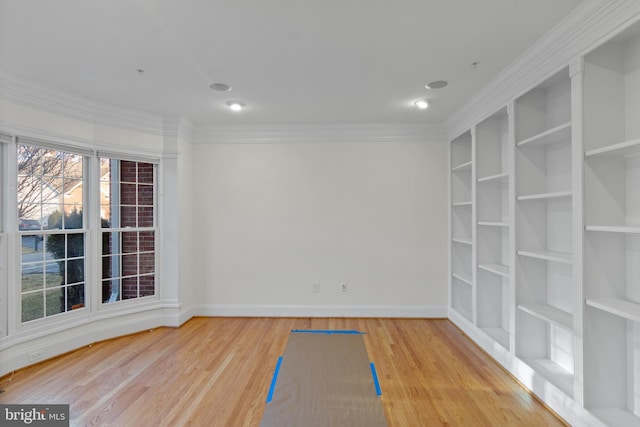14603 Turner Wootton Pkwy, Upper Marlboro, MD 20774 - exercise area with wood finished floors, crown molding, baseboards, and built in shelves