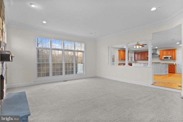 14603 Turner Wootton Pkwy, Upper Marlboro, MD 20774 - unfurnished living room featuring crown molding, light carpet, baseboards, ceiling fan, and recessed lighting