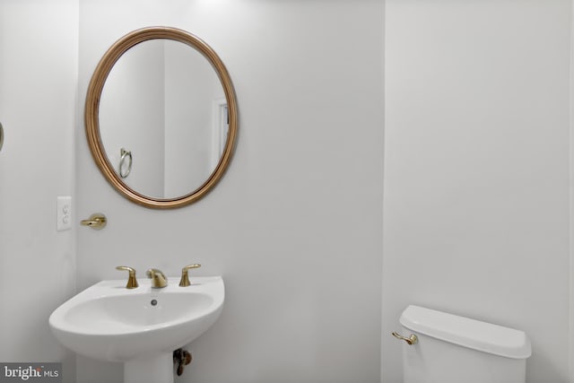 14603 Turner Wootton Pkwy, Upper Marlboro, MD 20774 - half bath featuring toilet and a sink