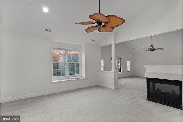 14603 Turner Wootton Pkwy, Upper Marlboro, MD 20774 - unfurnished living room with a ceiling fan, carpet flooring, high vaulted ceiling, baseboards, and a multi sided fireplace