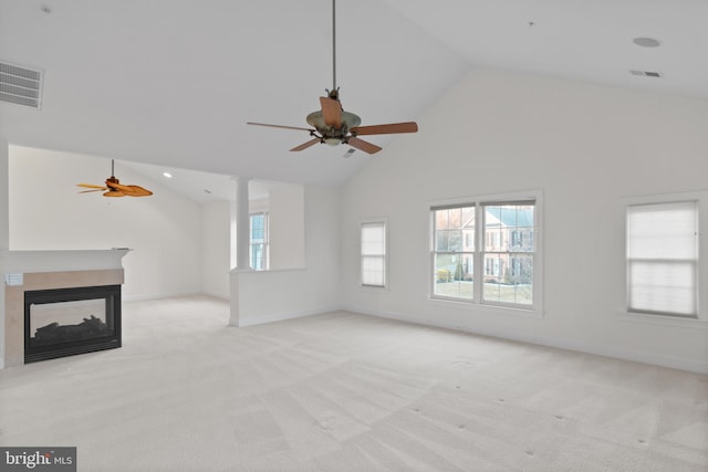 14603 Turner Wootton Pkwy, Upper Marlboro, MD 20774 - unfurnished living room featuring a ceiling fan, light colored carpet, high vaulted ceiling, a multi sided fireplace, and baseboards