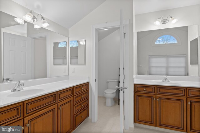 14603 Turner Wootton Pkwy, Upper Marlboro, MD 20774 - full bath with lofted ceiling, vanity, toilet, and tile patterned floors
