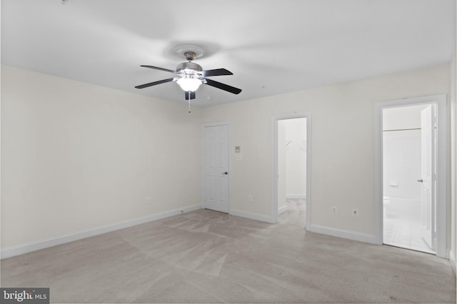 14603 Turner Wootton Pkwy, Upper Marlboro, MD 20774 - spare room featuring ceiling fan, light colored carpet, and baseboards