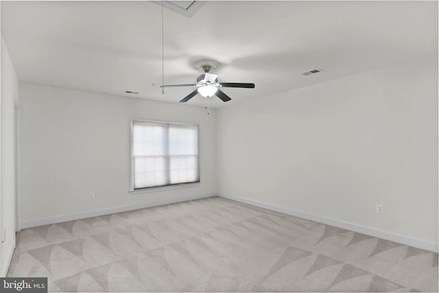 14603 Turner Wootton Pkwy, Upper Marlboro, MD 20774 - spare room featuring light colored carpet, a ceiling fan, baseboards, and attic access