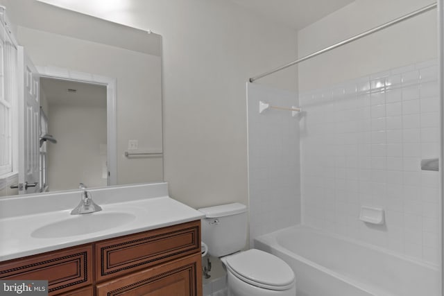 14603 Turner Wootton Pkwy, Upper Marlboro, MD 20774 - bathroom featuring toilet, vanity, and tub / shower combination