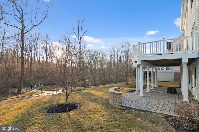 14603 Turner Wootton Pkwy, Upper Marlboro, MD 20774 - view of grassy yard with a wooden deck and a patio area