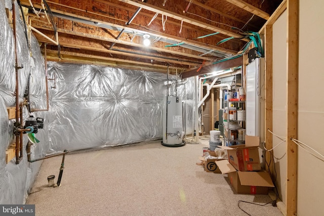 14603 Turner Wootton Pkwy, Upper Marlboro, MD 20774 - unfinished basement with water heater and carpet floors