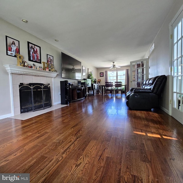 355 Leonard Ave, Hamilton, NJ 08619 - living area featuring a tile fireplace, wood finished floors, and ceiling fan