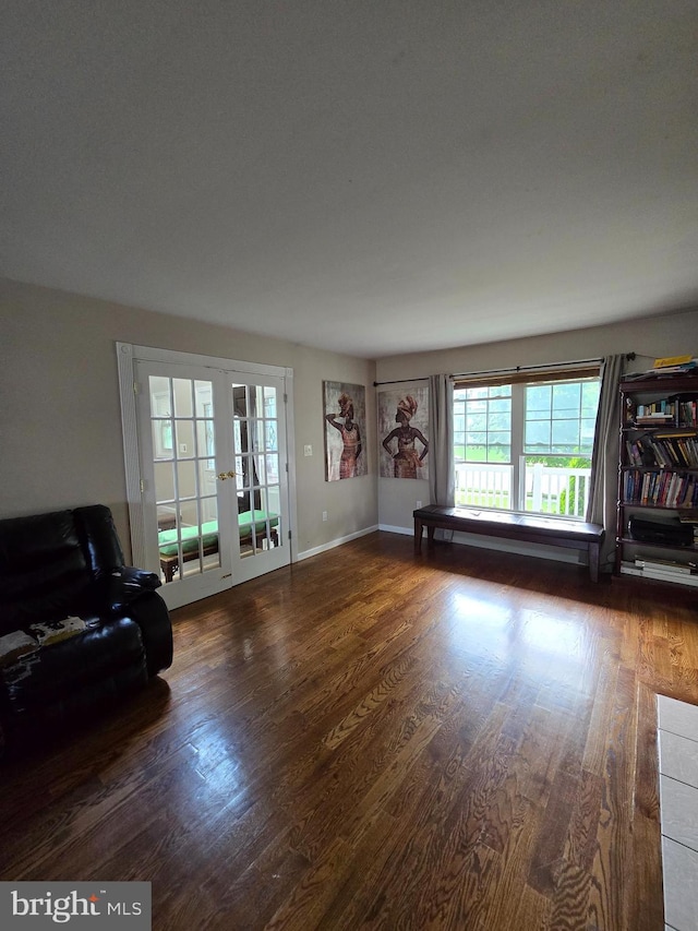 355 Leonard Ave, Hamilton, NJ 08619 - living room with french doors, healthy amount of natural light, and wood finished floors