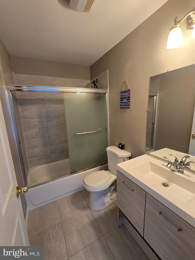 355 Leonard Ave, Hamilton, NJ 08619 - full bathroom with tile patterned flooring, vanity, and bath / shower combo with glass door