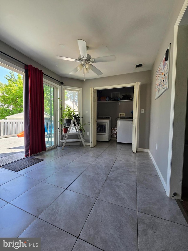 355 Leonard Ave, Hamilton, NJ 08619 - unfurnished living room featuring tile patterned floors, a ceiling fan, and independent washer and dryer