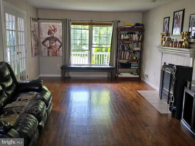 355 Leonard Ave, Hamilton, NJ 08619 - living room featuring healthy amount of natural light, wood finished floors, and a fireplace