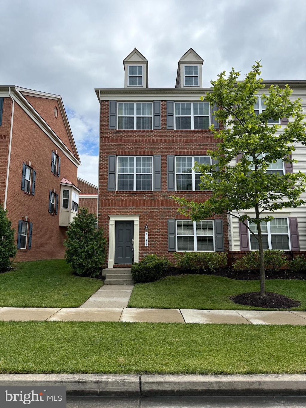 7822 Quidditch Ln, Elkridge, MD 21075 - view of front facade featuring a front lawn and brick siding