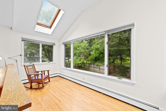 3 Vanderveer Dr, Lawrenceville, NJ 08648 - sitting room with a baseboard radiator, a skylight, lofted ceiling, and wood finished floors