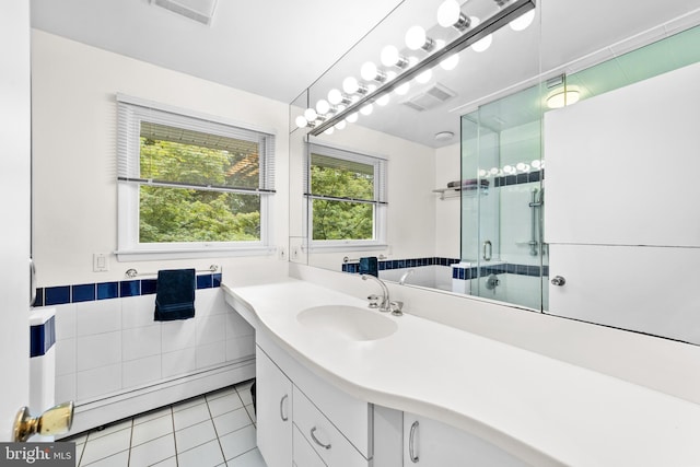 3 Vanderveer Dr, Lawrenceville, NJ 08648 - bathroom with tile patterned floors, a shower stall, vanity, and tile walls