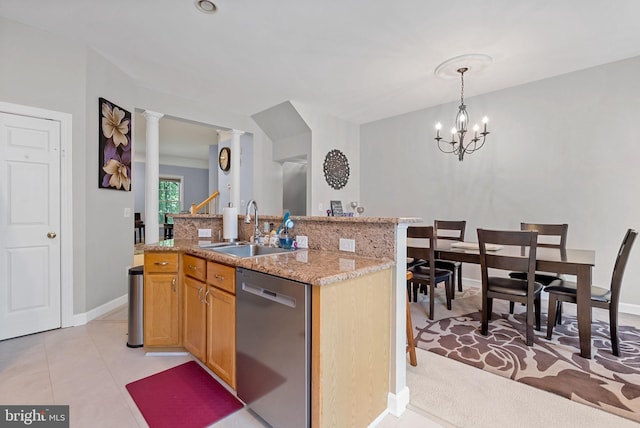 4320 Thomas Brigade Ln, Fairfax, VA 22033 - kitchen with stainless steel dishwasher, a sink, baseboards, decorative light fixtures, and a chandelier