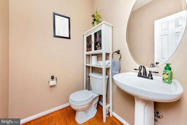 18 Basket Ct, Stafford, VA 22554 - half bathroom featuring toilet, wood finished floors, and baseboards