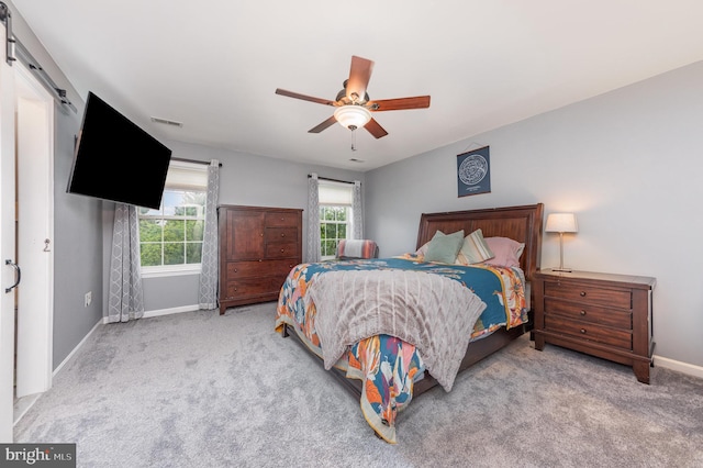 18 Basket Ct, Stafford, VA 22554 - carpeted bedroom featuring baseboards, a ceiling fan, and a barn door
