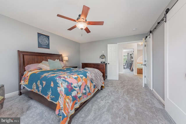 18 Basket Ct, Stafford, VA 22554 - bedroom featuring a barn door, carpet floors, ceiling fan, and baseboards
