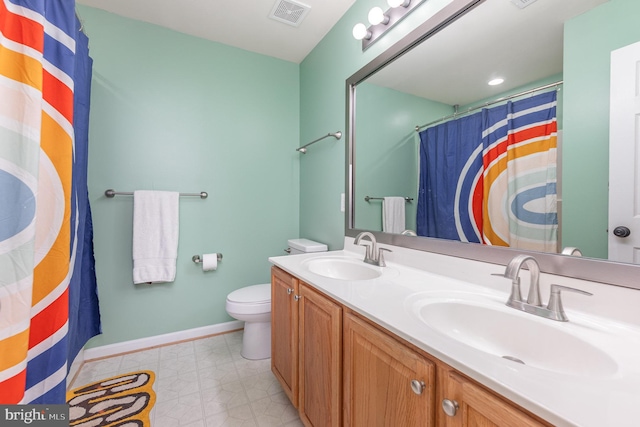 18 Basket Ct, Stafford, VA 22554 - full bathroom featuring double vanity, toilet, baseboards, curtained shower, and tile patterned floors