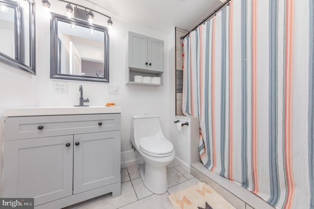 18 Basket Ct, Stafford, VA 22554 - full bath featuring vanity, tile patterned flooring, toilet, a shower with shower curtain, and baseboards