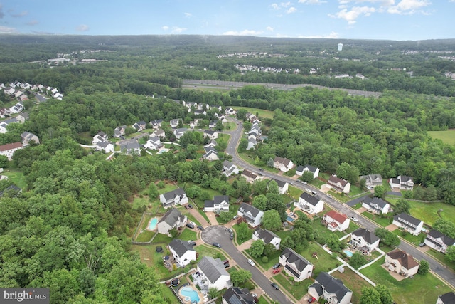 18 Basket Ct, Stafford, VA 22554 - aerial overview of property's location with a forest and nearby suburban area