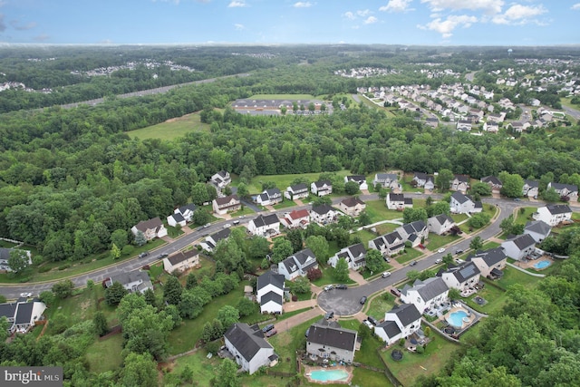 18 Basket Ct, Stafford, VA 22554 - aerial overview of property's location with a forest and nearby suburban area
