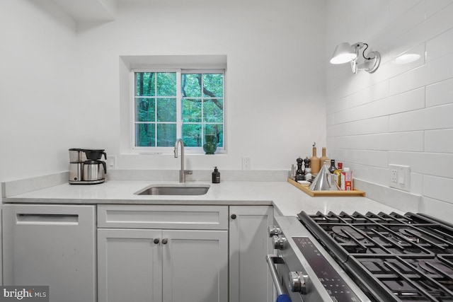3503 Martha Custis Dr, Alexandria, VA 22302 - kitchen with a sink, white cabinets, stainless steel appliances, and light countertops