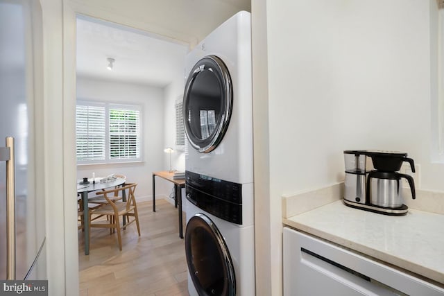 3503 Martha Custis Dr, Alexandria, VA 22302 - laundry room featuring stacked washer / drying machine and light wood-style floors